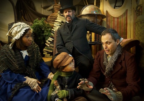 Orlando Shakespeare Theater's 'A Christmas Carol.' L to R: Danielle Renee, Steven Patterson (standing), Parker Sims-Chin, & Steven Lane. Photo by Landon St. Gordon