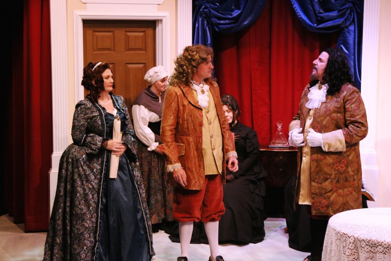 From left, front: Christina LaFortune, Adrian Cahlll and Michael Fiore in "Tartuffe" at Melbourne Civic Theatre
