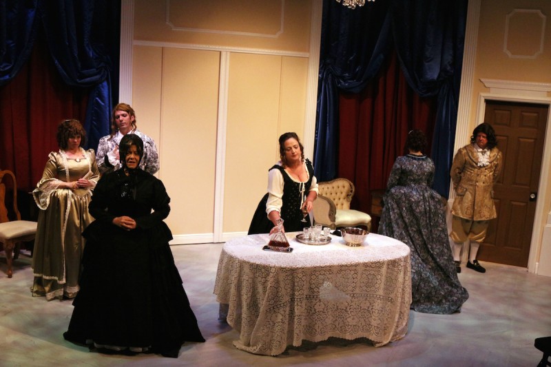 From left: Emily Pickens, Anthony DeTrano (in back), Nelia Lake, Tracey Thompson, Christina LaFortune (back turned) and Peter Olander in Melbourne Civic Theatre's 'Tartuffe.'