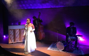 Kristen Warren as Lady Day with Jarred Aramstrong on piano and Ethan Bailey Gould on bass and Ashton Gould on percussion Photo by Pam Harbaugh