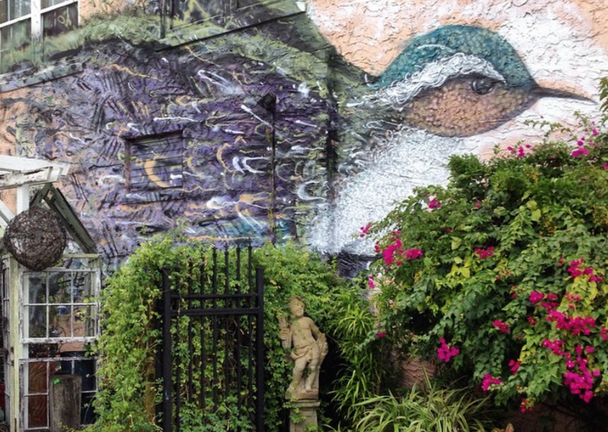 A mural painted by Christopher Maslow on the wall of the Eau Gallie Florist